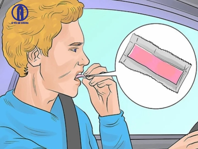 Hình: Nhai kẹo cao su khi lái xe